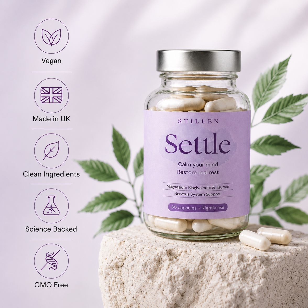 Jar of 'Settle' magnesium sleep supplements with a purple label on a light background with green leaves showing Vegan, GMO free, Clean ingredients, Science Backed
