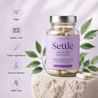 Jar of 'Settle' magnesium sleep supplements with a purple label on a light background with green leaves showing Vegan, GMO free, Clean ingredients, Science Backed